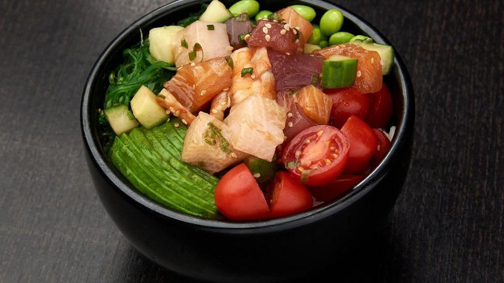 Bara Chirashi Poke Bowl* · Ahi tuna, salmon, yellowtail, shrimp, cucumber and green onions mixed with poke sauce; served with grape tomatoes and avocados, edamame and seaweed salad; topped with sesame seeds.