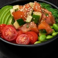 Salmon Poke Bowl · Salmon, cucumber and green onions mixed in poke sauce; served with grape tomatoes, avocados,...