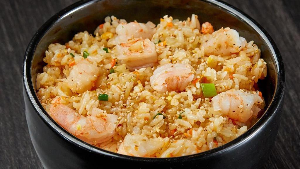Rackin' Shrimp Rice · A classic fried rice recipe. Shrimp, rice, egg and chopped vegetables.. Choose your serving size.