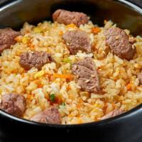 Rackin' Steak Rice · A classic fried rice recipe. Steak, rice, egg and chopped vegetables.. Choose your serving s...