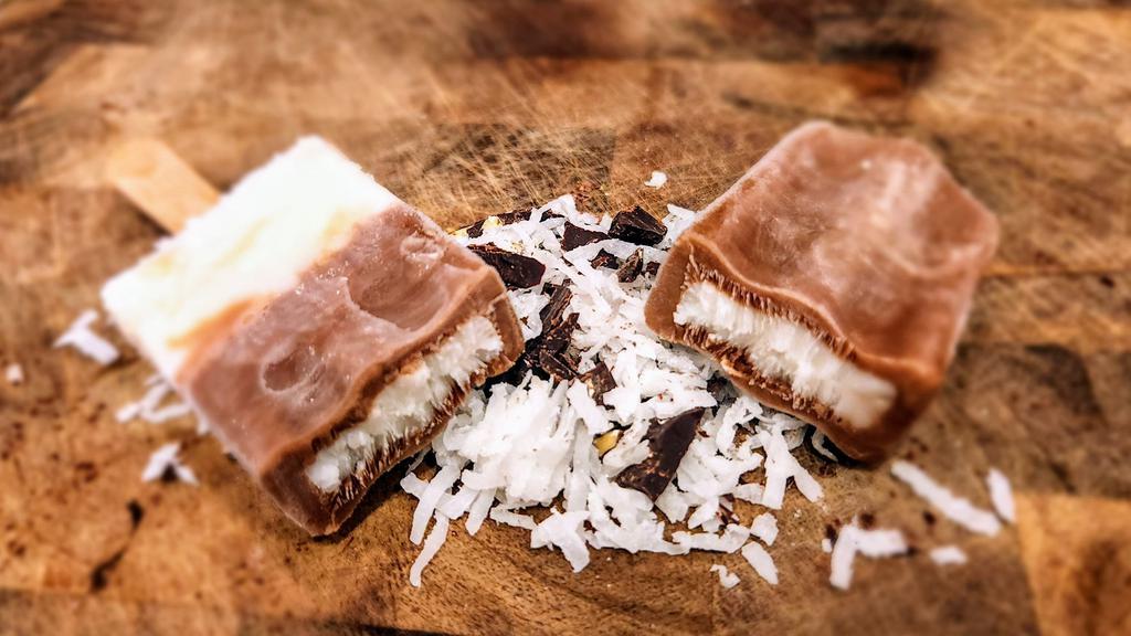Chocolate Coconut Filled Pop · Our decadent Chocolate Fudgesicle cradles our Toasted Coconut in delicious unison with this first flavor in our premium line.