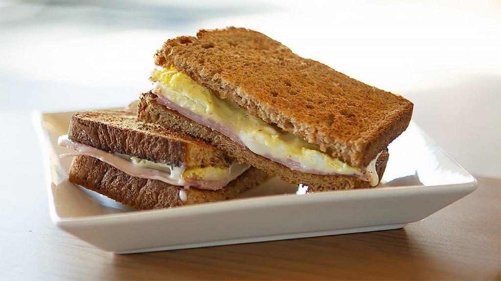 Breakfast Toast Combo · Ham, Cheese & Egg.