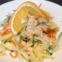 Mango Salad · Organic carrot, daikon, cucumber, mango mix with light vinaigrette and nuts.