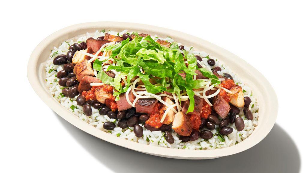 High Protein Bowl · White Rice, Chicken, Steak, Black Beans, Tomatillo-Red Chili Salsa, Cheese and Shredded Romaine Lettuce