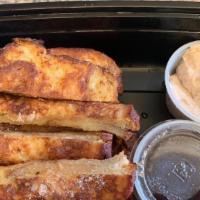 C Me Rollin · Cinnamon swirl bread dipped in our homemade golden good good batter w/ butter drizzle and ci...