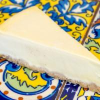 Slice of Cheesecake · Classic cheesecake with a rich, dense, smooth, and creamy consistency.