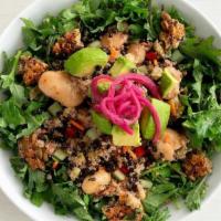 Kale + Quinoa Power Salad  · Organic quinoa served on a bed of marinated chopped kale with cucumber, carrot, avocado, dri...