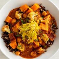 Masala Chickpea Curry Bowl · Roasted butternut squash, turmeric cauliflower and braised cabbage served over masala-spiced...