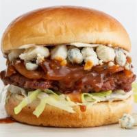 Steakhouse Burger · Beyond Burger, caramelized onion sauce, blue cheese crumbles, iceberg lettuce, and horseradi...