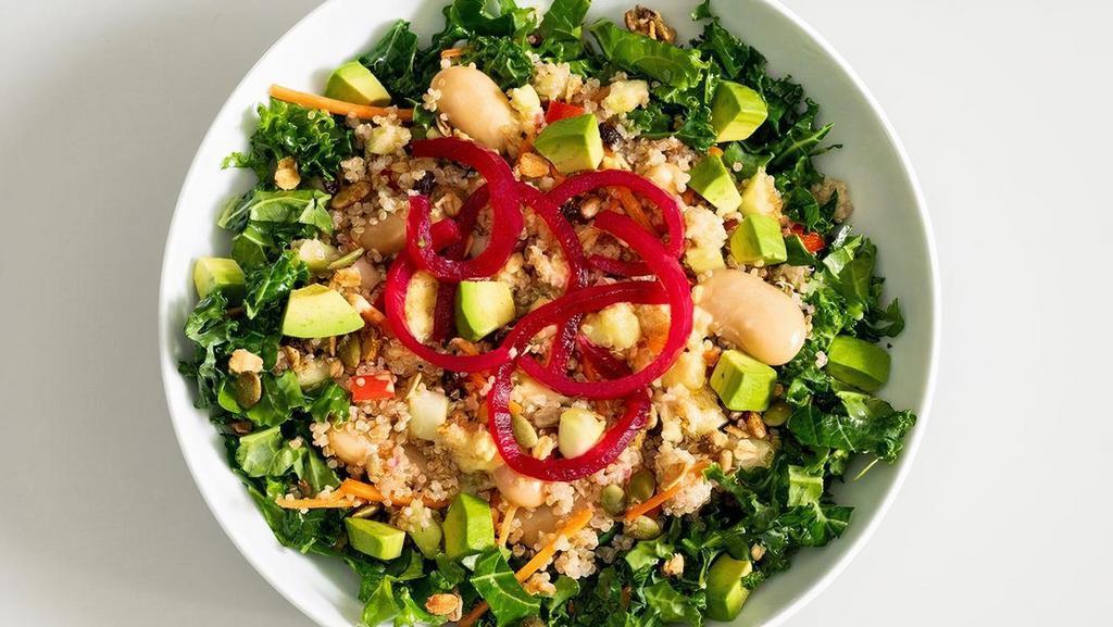 Kale + Quinoa Power Salad  · Organic quinoa served on a bed of marinated chopped kale with cucumber, carrot, avocado, dried currants, bell peppers, gigande beans, pickled onions and 3-seed crunch served with a mango-lemon vinaigrette  | 530-810 cals | Gluten-friendly..