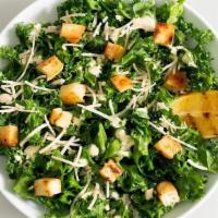 Kale Caesar  · Chopped kale tossed in our signature Caesar dressing with parmesan, flatbread croutons and g...