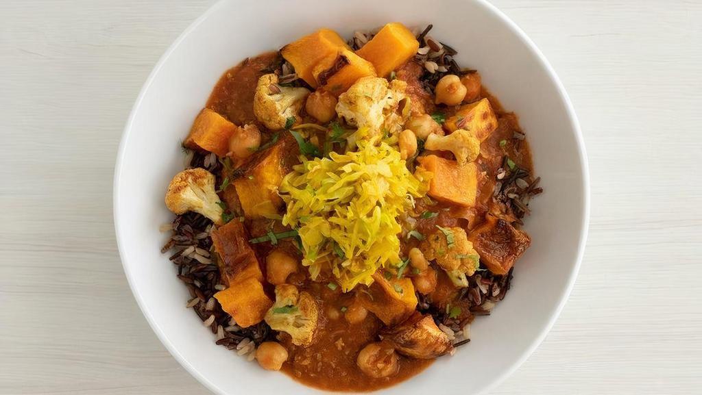 Masala Chickpea Curry Bowl · Roasted butternut squash, turmeric cauliflower and braised cabbage served over masala-spiced chickpea curry, brown rice and cilantro | Add grilled tempeh or crispy chickin' (+$3.95) | 870 cals | Gluten-friendly..