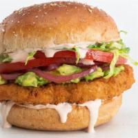 Santa Fe Chick'N · Crispy chick'n, mashed avocado, southwest mayo, lettuce, tomato, and pickled onion on a toas...