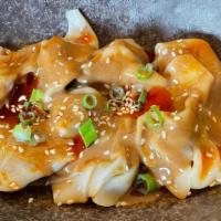 Pork Dumpling  Chili Oil. (8 Pcs) · Spicy. with sesame sauce and Red chili Oil.