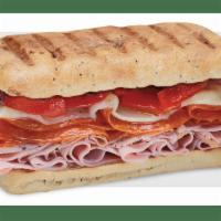 Sicilian · Slow-cured ham, prosciuttini, pepperoni, provolone and roasted red peppers with creamy Itali...