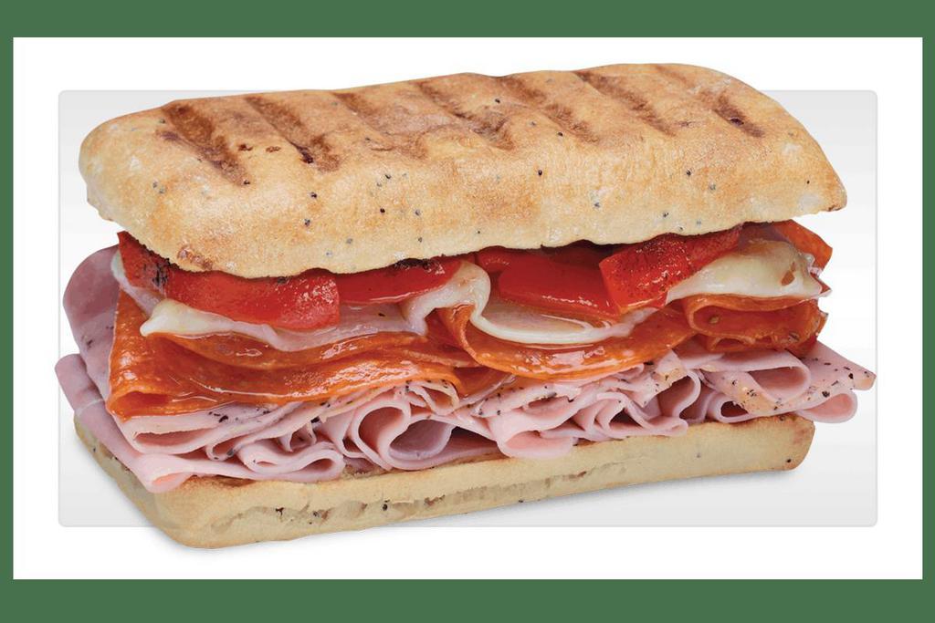 Sicilian · Slow-cured ham, prosciuttini, pepperoni, provolone and roasted red peppers with creamy Italian dressing