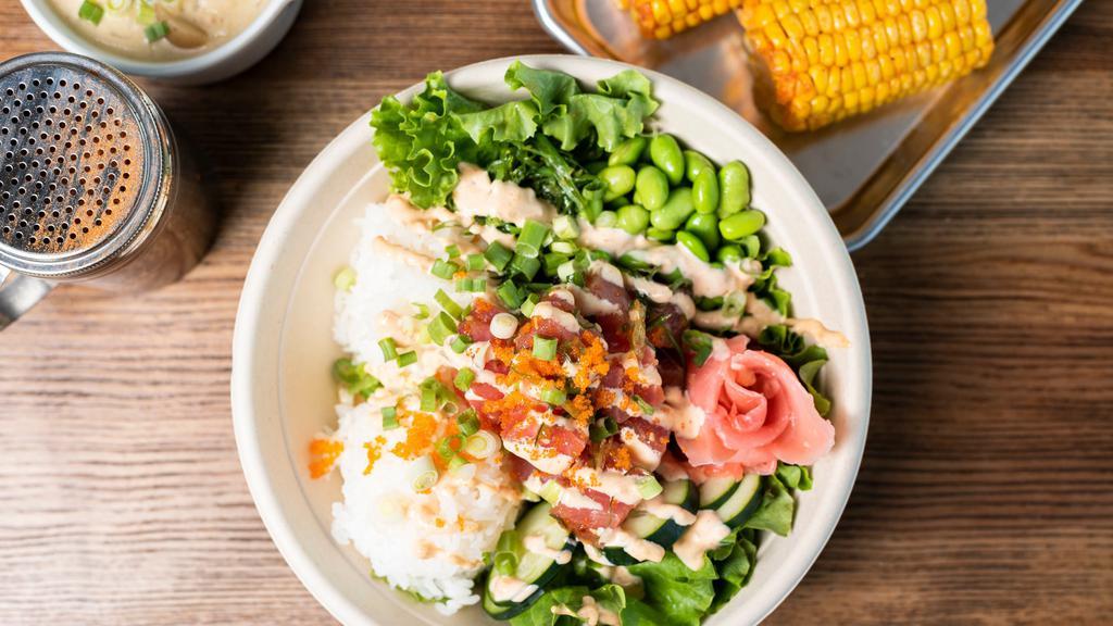 Poke Bowl · Spicy mayo salmon or tuna. masago, cucumber, edamame, corn, seaweed, furikake, ginger, green onion served over rice or salad. Add Avocado (82).
