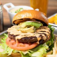 Angus Beef Burger · grass-Fed (1/2 lb) beef, mayonnaise, mustard, lettuce, tomato onion & pickle on a brioche bu...
