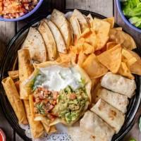 Fiesta Platter · Delicious platter made with Nachos, garlic prawns, chicken flauta, corn quesadilla, grilled ...