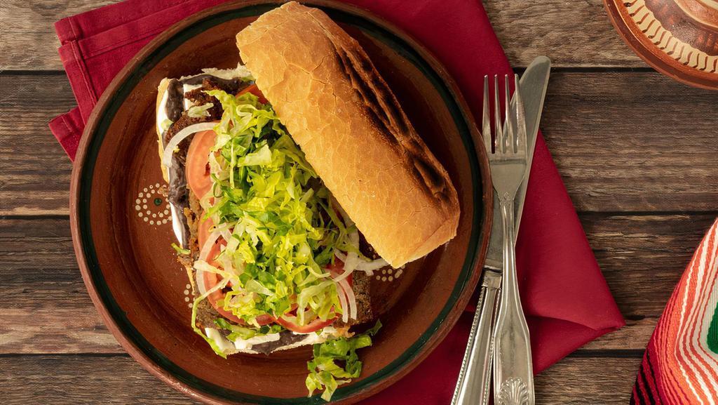 Tortas · Mexican Sandwich with mayo, refried beans, queso fresco, onion, lettuce and tomato and the filling of your choice