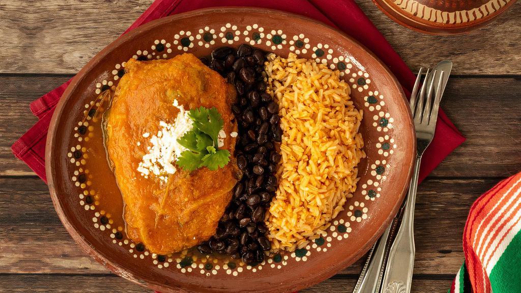 Chile Relleno (PF) · Stuffed poblano pepper with cheese, battered in egg and topped on a tomato broth. Served with rice and beans