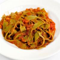 Catering Pappardelle All’ Osteria · Spinach ribbon pasta, prosciutto, pomodoro, mushrooms.