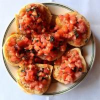 Bruschetta · Slices of toasted bread, topped with fresh tomato and basil