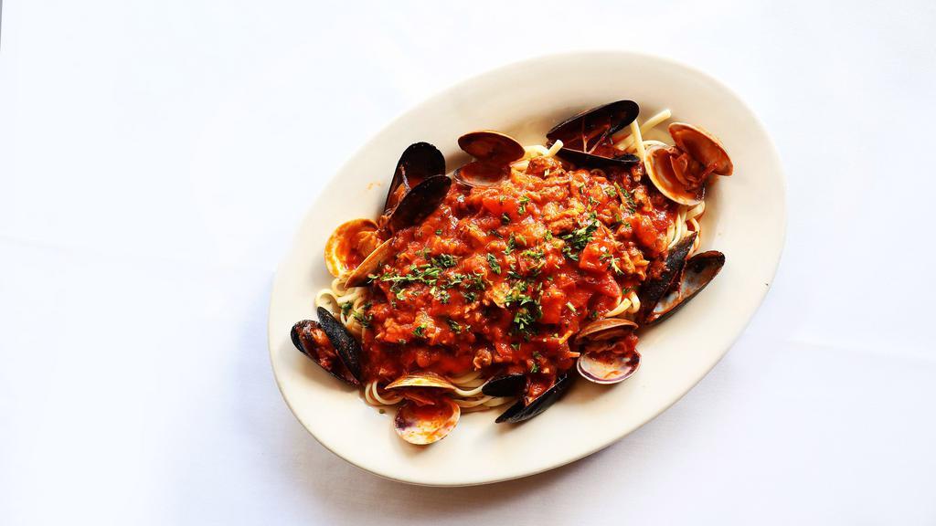 Linguine with Clams and Mussels · Whole clams and mussels in a tomato sauce