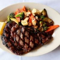 Rib Eye Steak · Served with mixed vegetables