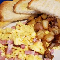 Minced Ham and Eggs. · Minced ham is scrambled with two eggs and served with Sams spuds and biscuit, toast, English...