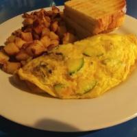 Garden Patch Omelette. · Perfect For Our Vegetarian Friends! Eggs are prepared omelet style folded over mushrooms fre...