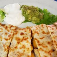 Quesadilla · Chicken breast, ground beef, or Ortega chilies with melted jack and cheddar cheese are sandw...