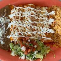 Enchiladas Chx Rojo Sauce · With three rolled corn tortillas with chicken bathed with red sauce and melted mozzarella ch...