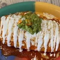 Wet Burritos · Any type of burrito can be a wet burrito with red sauce, cheese, sour cream, and guacamole.