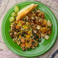 VEGGIE JOE · Morning Star veggie links, spinach, mushrooms, tomatoes and sharp cheddar cheese scrambled w...