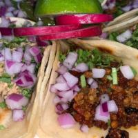 Mini Tacos a la Carte · Carne asada, pollo azado, cabeza, and lengua.