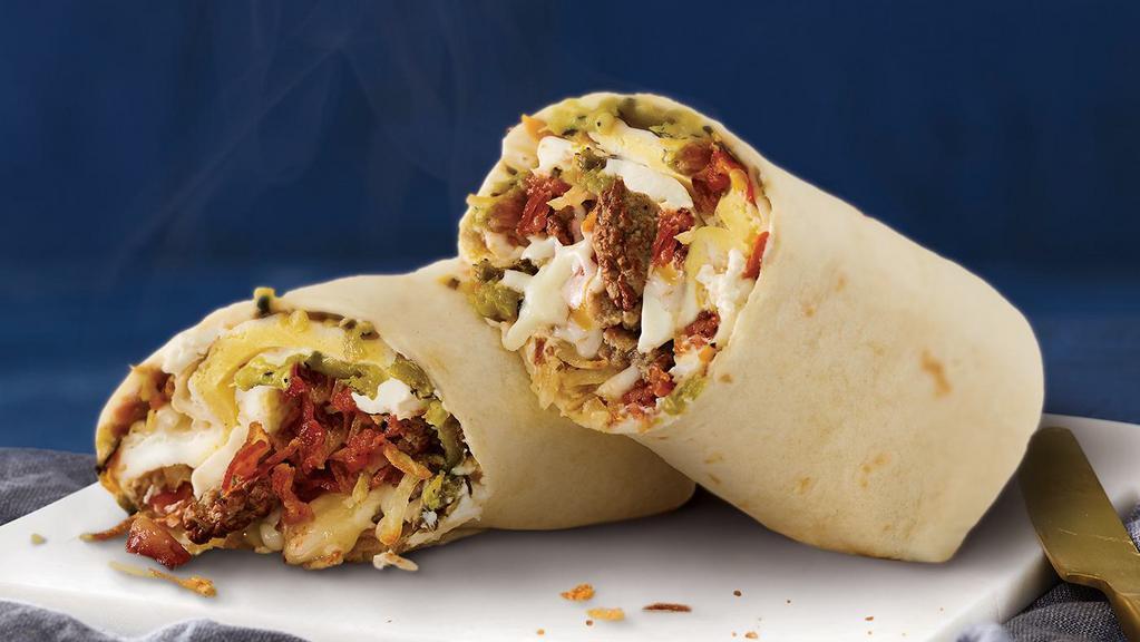 Big Breakfast Burrito · Cage-Free Eggs, Turkey-Sausage, Bacon, Cheese, Green Chiles, Shredded Hash Browns, Salsa and Plain Shmear in a Flour Tortilla