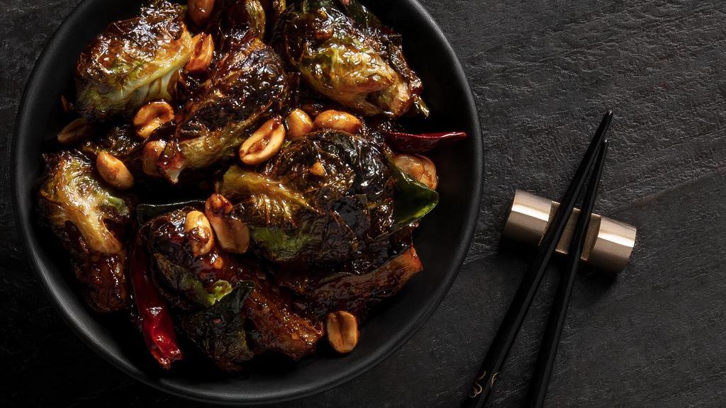 Kung Pao Brussels Sprouts · Wok-charred Brussels sprouts, peanuts, chili pods, Kung Pao sauce