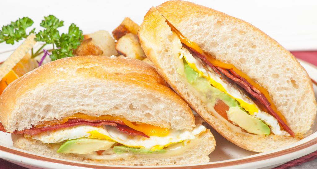 Breakfast Sandwich 2.0 · Butter-grilled ciabatta filled with a fried egg,bacon, Jack and Cheddar cheese, avocado and tomato.