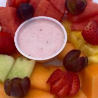 Seasonal Fresh Fruit Plate · Served with a side of strawberry-yogurt sauce.