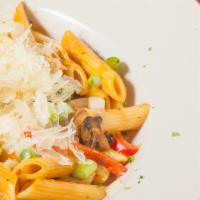 Chipotle-Alfredo Pasta · Penne pasta tossed with spicy chipotle-alfredo, chicken, red bell peppers, green onion, mush...