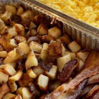 Eye Opener · Scrambled eggs, country-style hashbrowns, choice of sausage, bacon, ham or chicken apple sau...