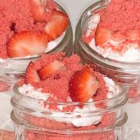 Vegan Strawberry Crunch Cheesecake Jar · Vanilla cake base topped with no-bake cheesecake and fresh strawberries and dried strawberri...