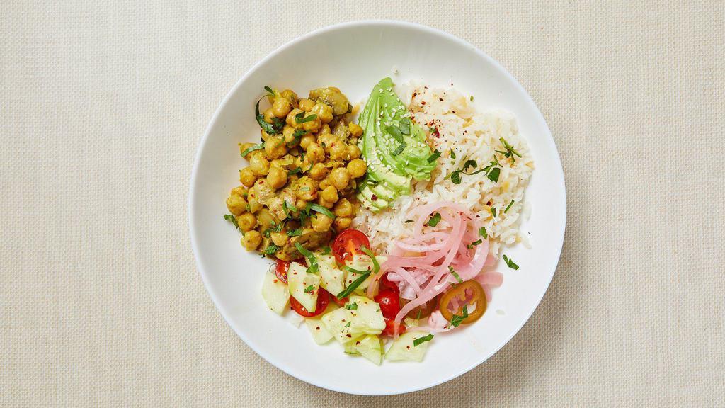 Mediterranean Chickpeas Rice Bowl (V) · Roasted curry chickpeas with mushroom, jasmine rice with gluten free orzo, grape tomato, cucumber, parsley, avocado and pickled red onion. Served with hot sauce. Gluten-free. Vegan.