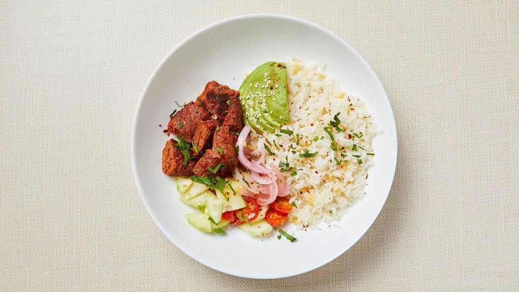 Mediterranean Meatball Rice Bowl · Roasted lamb & beef kebab, jasmine rice with gluten free orzo, grape tomato, cucumber, parsley, avocado and pickled red onion. Served with cucumber-yogurt sauce. Gluten-free. Dairy-free (no yogurt sauce).