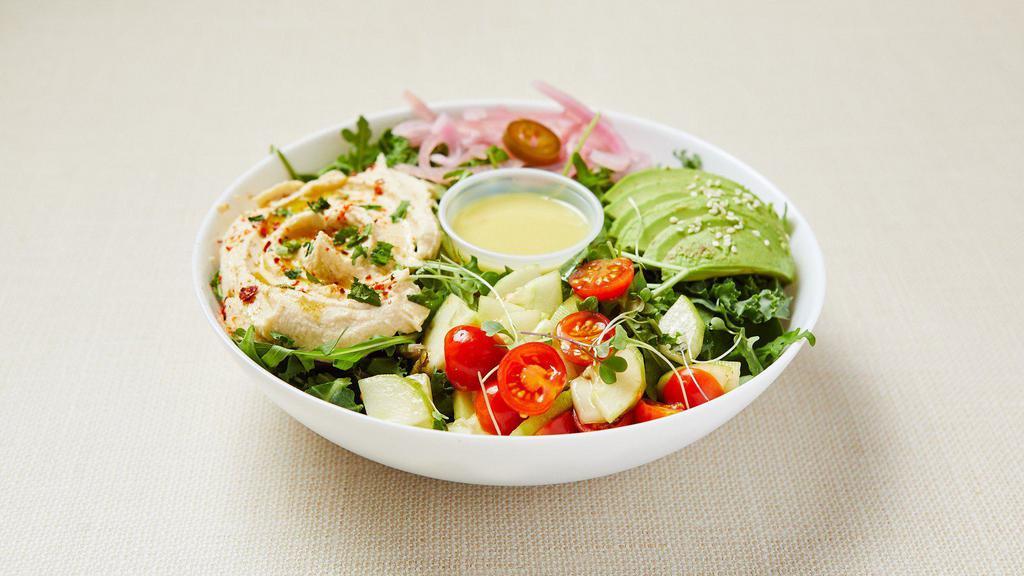 Vegan Hummus Salad · Mixed green salad (arugula, spinach, lettuce) served with homemade creamy hummus, grape tomato, cucumber, parsley, avocado, pickled red onion and lemon-mustard vinaigrette. Vegan. Gluten-free.