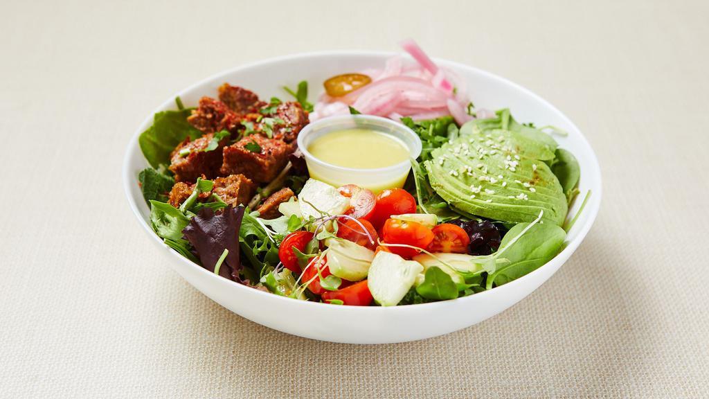 GF Beyond Salad (V) · Mixed green salad (arugula, spinach, lettuce) served with seasoned Beyond (plant-based) meatballs, grape tomato, cucumber, parsley, avocado, pickled red onion and lemon-mustard vinaigrette. Gluten-free. Vegan.