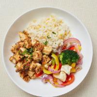 Paleo Chicken Rice Bowl · Cauliflower rice, cilantro-lime marinated chicken and roasted seasonal vegetables (bell pepp...