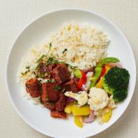 Paleo Meatball Rice Bowl · Cauliflower rice, Beyond (plant-based) meatballs and roasted seasonal vegetables (bell peppe...