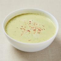 Broccoli Soup (V) · Blended broccoli and onion with coconut cream. Gluten-free. Vegan. Keto. Paleo.